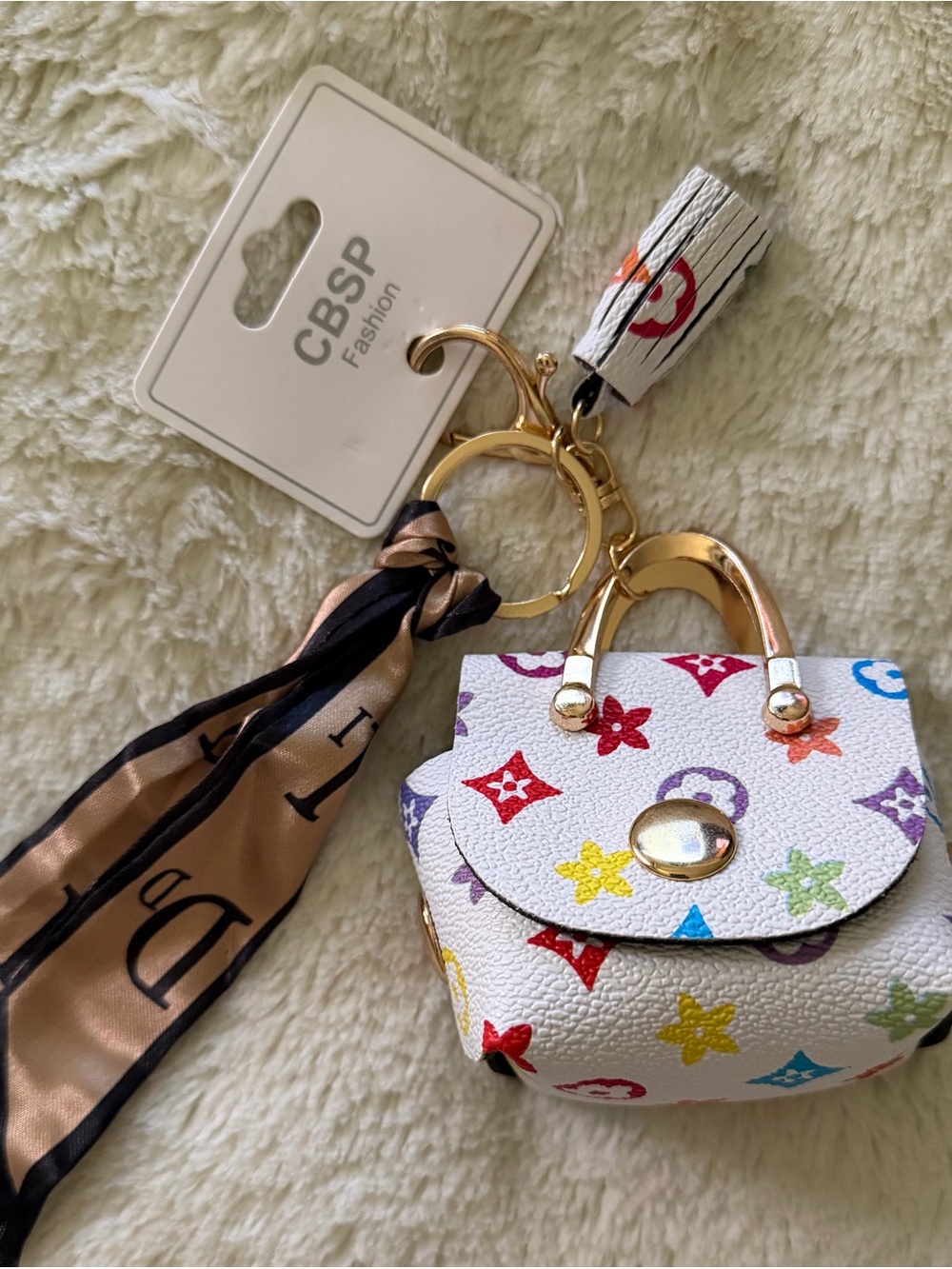NWT-Fashion-white multicolor mini bag charm/keychain with scarf accent.